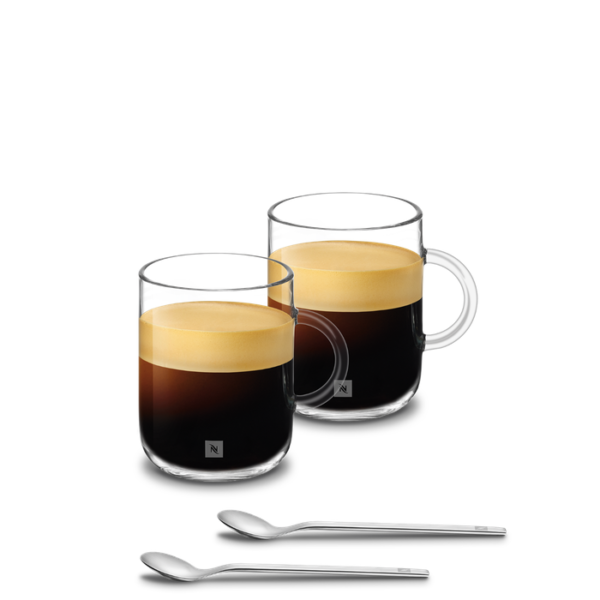 Close-up of Nespresso Vertuo Mugs Silver Rim Top-down view of two Nespresso Vertuo mugs side by side on white surface showing round shape and silver accents