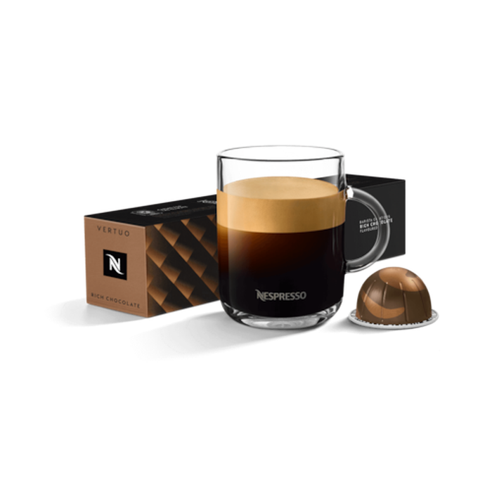 Nespresso Vertuo Barista Creations Rich Chocolate Coffee in Mug Close up steaming mug of Nespresso Vertuo Barista Creations Rich Chocolate coffee with rich chocolate crema smooth finish