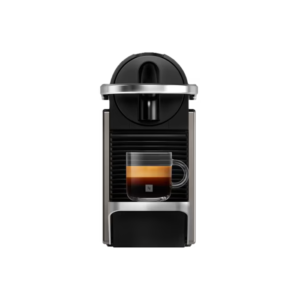 Nespresso Original Pixie Titan coffee machine front view with polished metal sides and chrome accents, ready to brew espresso