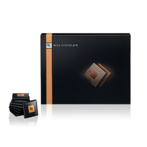 NESPRESSO Milk Chocolate Squares in elegant packaging, perfect coffee companion for indulgent moments with coffee lovers