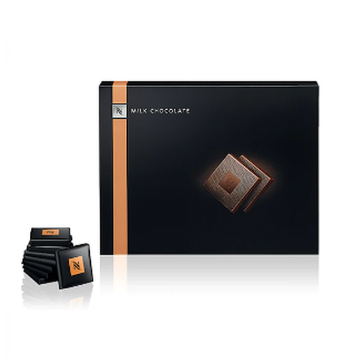 NESPRESSO Milk Chocolate Squares in elegant packaging, perfect coffee companion for indulgent moments with coffee lovers