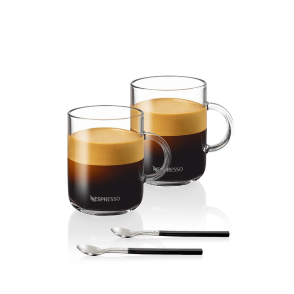 Nespresso Vertuo Coffee Mug with Brewed Coffee Hand holding a Nespresso Vertuo mug filled with freshly brewed coffee showcasing the silver metallic accent and logo