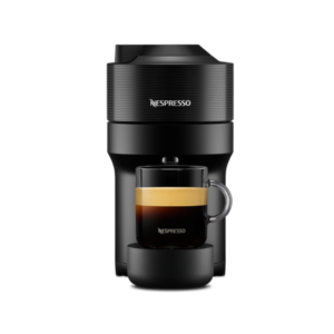 Nespresso Vertuo Pop machine brewing a rich espresso with thick crema into a white cup showing perfect extraction process